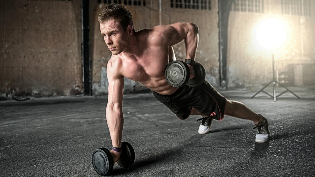 A muscular man performing a one-arm dumbbell row in an industrial-style gym, emphasizing strength and focus, with a bright light in the background creating contrast.