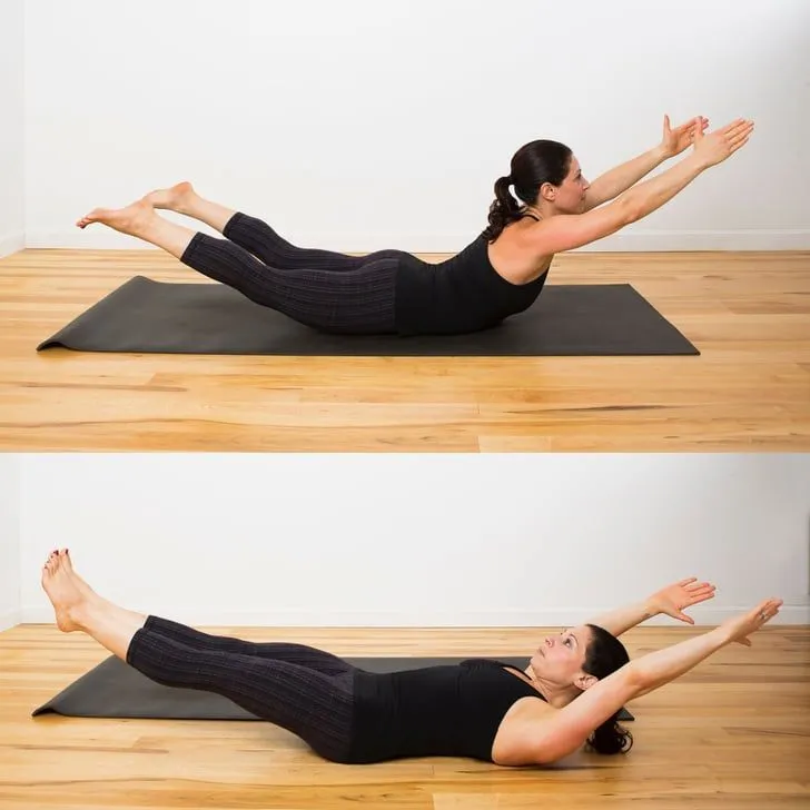 Person demonstrating Superman Hold, a bodyweight exercise for back strength, lying on a mat with arms and legs lifted.