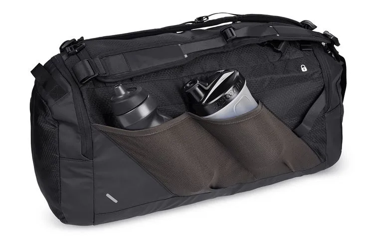 Durable black duffle bag with water bottles in mesh pockets, designed as one of the gym essentials for men, perfect for carrying workout gear and daily fitness accessories.