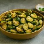 Roasted Brussel Sprouts Nutrition – bowl of crispy roasted brussel sprouts with herbs and seasoning.